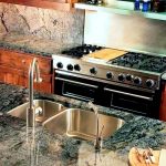 kitchen sink with stunning granite countertops