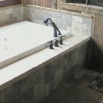 tub deck with hand-chiseled edges