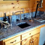 lue Bahia granite bar counter with granite backsplash and undermount sink
