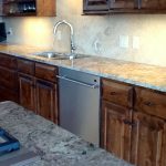 kitchen area with long granite countertop