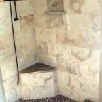 shower area with granite materials