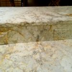 Custom painted outlet covers to match/blend with the granite backsplash