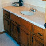 granite bathroom vanity top with hand-chiseled edges