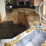 kitchen sink area with beautiful countertop design