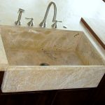 Custom granite farmhouse sink to match granite counters